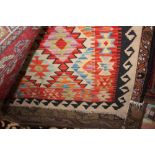 An approx 4'9" x 3'5" vegetable dye Chobi Kelim rug