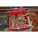 A box of various hand tools