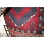 An approx 4'3" x 2'7" Gazak rug