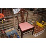 A mahogany dining chair