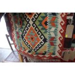 An approx 5'2" x 2'1" vegetable dye Chobi Kelim rug