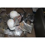 A quantity of heat protective clothing; hard hats