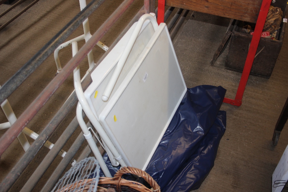 An air bed and two bed trays