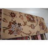 An approx. 3' x 2'6" floral patterned wood rug