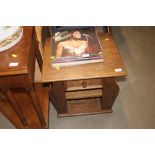 An oak magazine table fitted single drawer