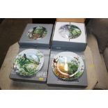 A quantity of boxed Wedgwood collector's plates