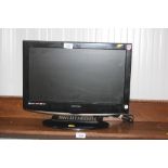 A Technika flat screen television with remote cont