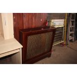 A reproduction mahogany radiator cover and three d