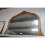 A mahogany bevel edged over mantle mirror