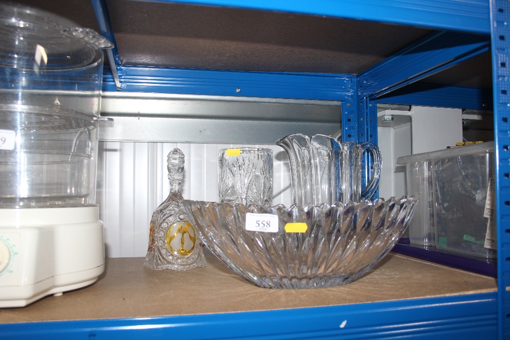 A cut glass bell; together with two cut glass vase