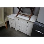 A white painted chest fitted four drawers and matc