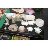 A quantity of various sheep ornaments