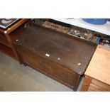 An oak blanket box and contents