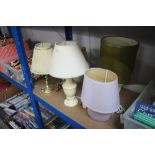 A quantity of various table lamps and shades