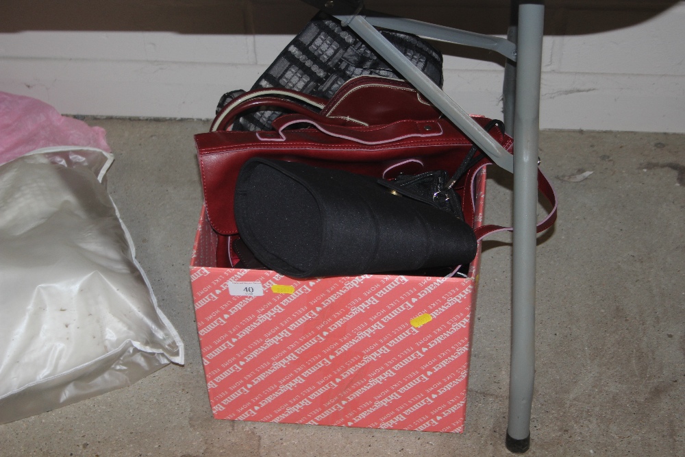 A box of ladies handbags