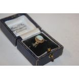 A 9ct gold opal set ring