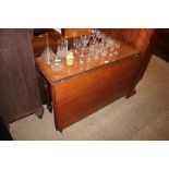 A 19th Century mahogany drop leaf dining table rai