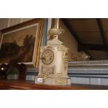 A Victorian alabaster and enamel mantel clock surm