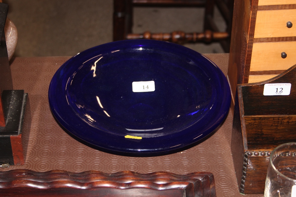 A large blue Kosta Boda glass dish, de