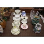 A quantity of various tea cups and saucers to incl