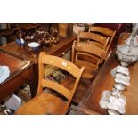 A set of four bar back kitchen chairs
