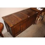 A large oak panelled coffer