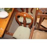 A pair of Victorian mahogany dining chairs with gr