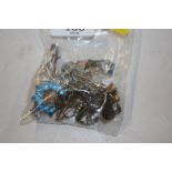 A bag of various white metal and other brooches, s