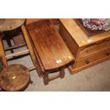 A small oak drop leaf coffee table