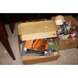 A box of books and cigarette cards