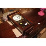 A modern mahogany cased three hole wall clock