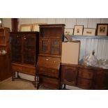 An oak and leaded glazed bureau bookcase