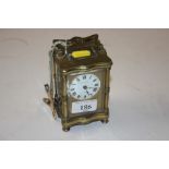 A brass cased carriage clock by Lowe & Sons of Che