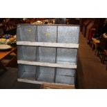 A set of painted galvanised pigeonholes