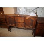 A 1920's barley twist oak sideboard