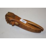 A pair of carved wooden novelty figural nut cracke