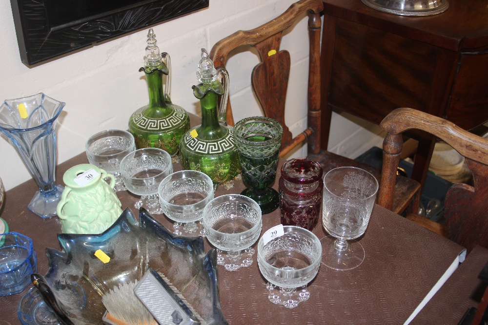 Five glass sundae dishes; two green glass decanter