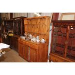 A modern pine dresser fitted three drawers