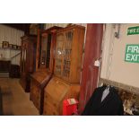 A 20th Century oak and leaded glazed bureau bookca