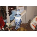 A Chinese blue and white vase and cover decorated