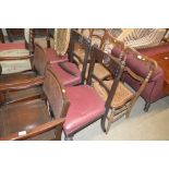 Three Victorian oak bar backed dining chairs - one