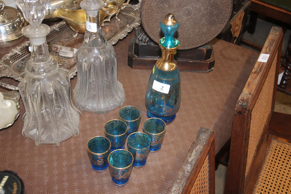 A Venetian style blue glass and gilt decorated liq