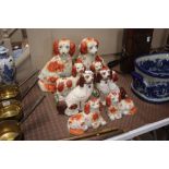 Four pairs of Staffordshire style spaniel ornament