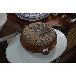 A Victorian walnut and inlaid circular stool