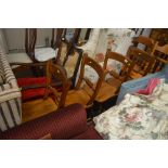 A set of four elm seated bar back kitchen chairs