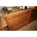 A Danish stripped pine chest fitted four long draw