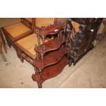 A Victorian four tier mahogany whatnot