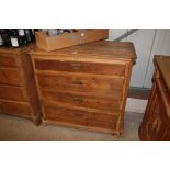 A Danish pine chest fitted four long drawers