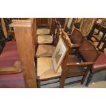 Four oak spindle back and rush seated dining chair