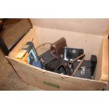 A Kodak box and contents of cameras